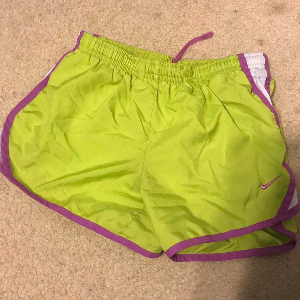 Green and purple nike shorts